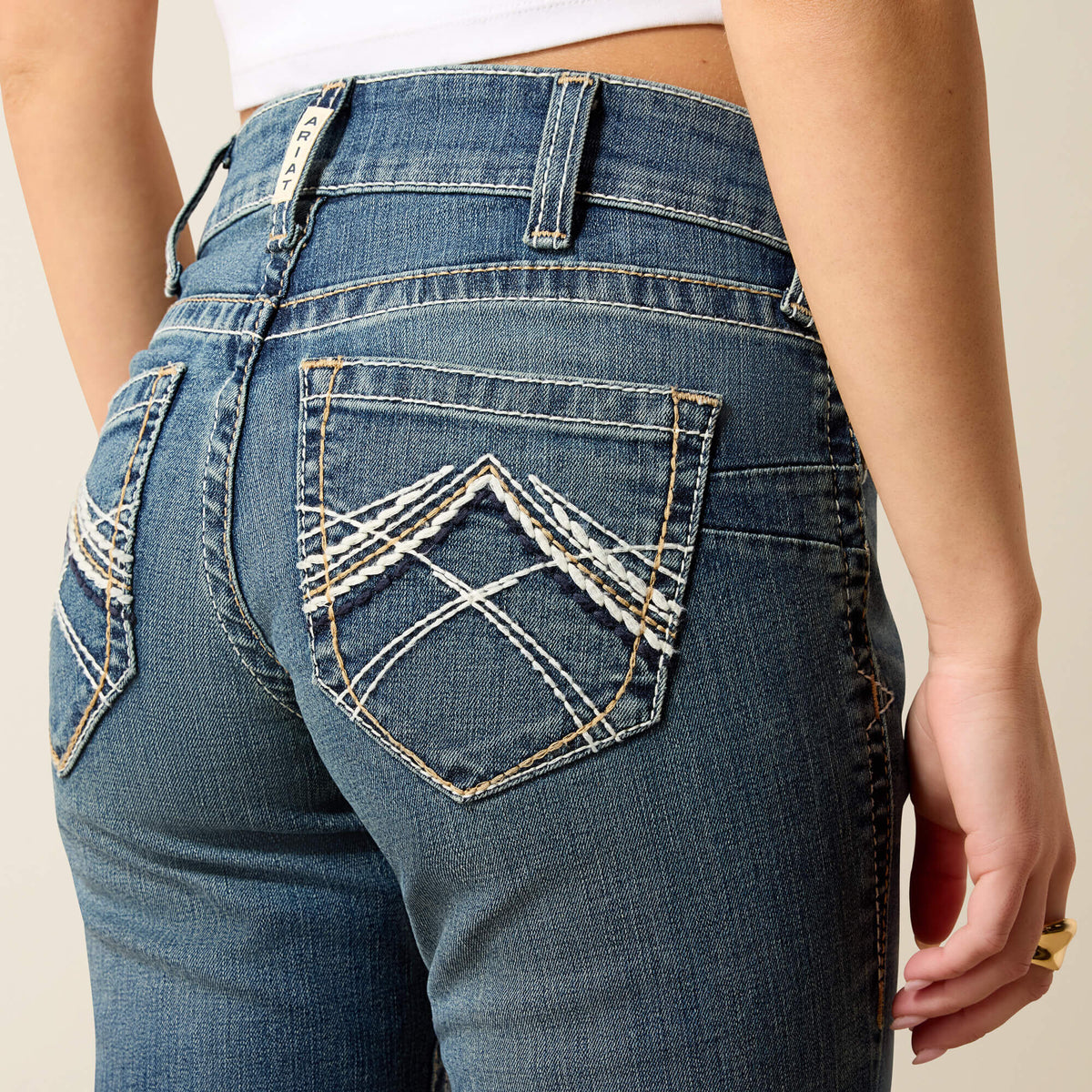 R.E.A.L. Mid Rise Whipstitch Boot Cut Jean - US 8291